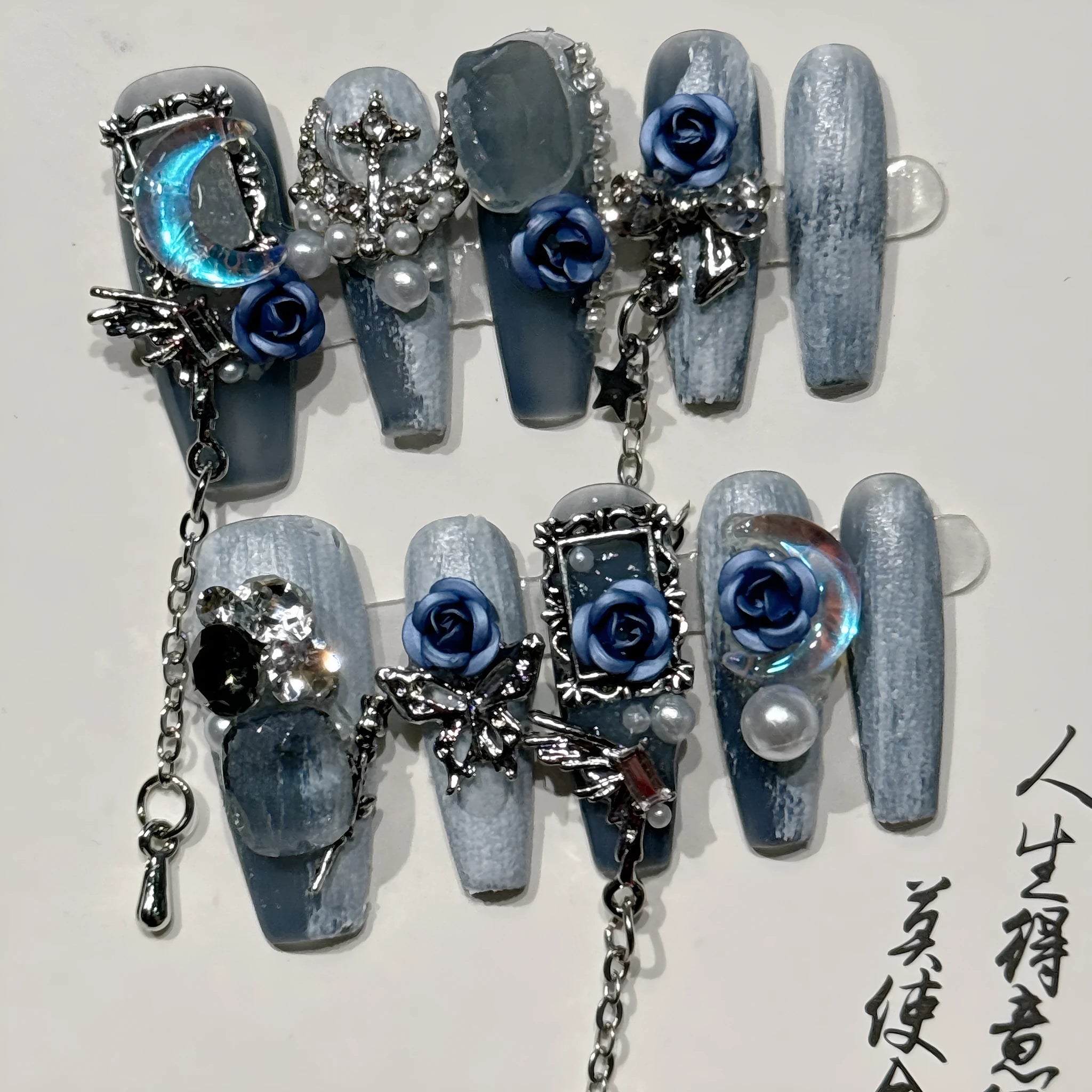 Heavy industry night blue false nails with rose and floral patterns in plastic armour suit