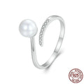Adjustable S925 sterling silver ring with a pearl on an open-loop band.