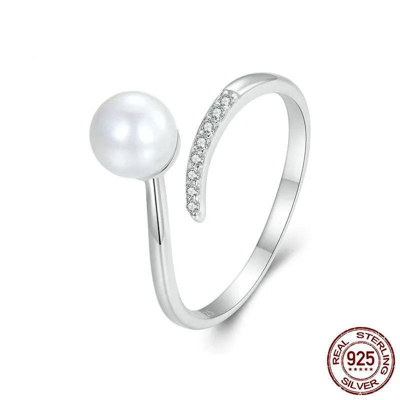Adjustable S925 sterling silver ring with a pearl on an open-loop band.