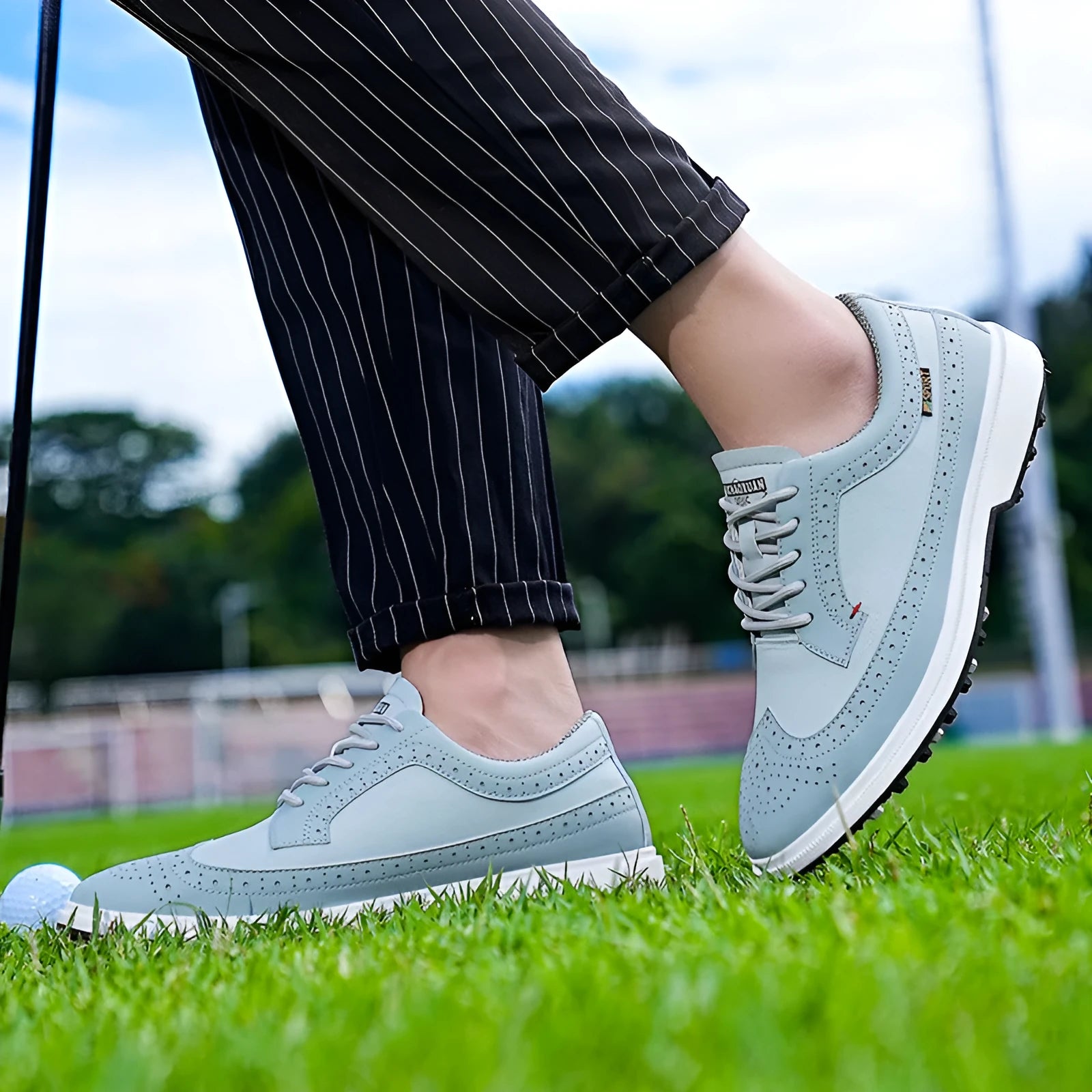 Men's genuine leather golf shoe in lake blue with a non-slip rubber outsole.