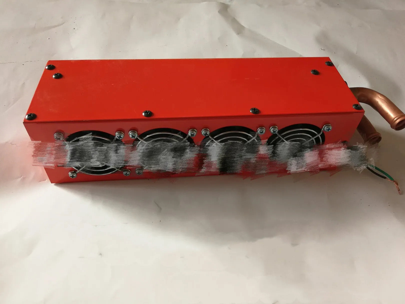 Metal car heater with four-hole copper pipe construction measuring 34cm long