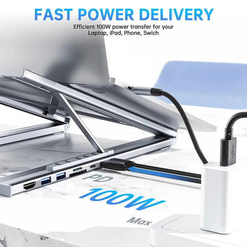 Aluminium folding laptop docking station showing 8-in-1 ports and raised stand.