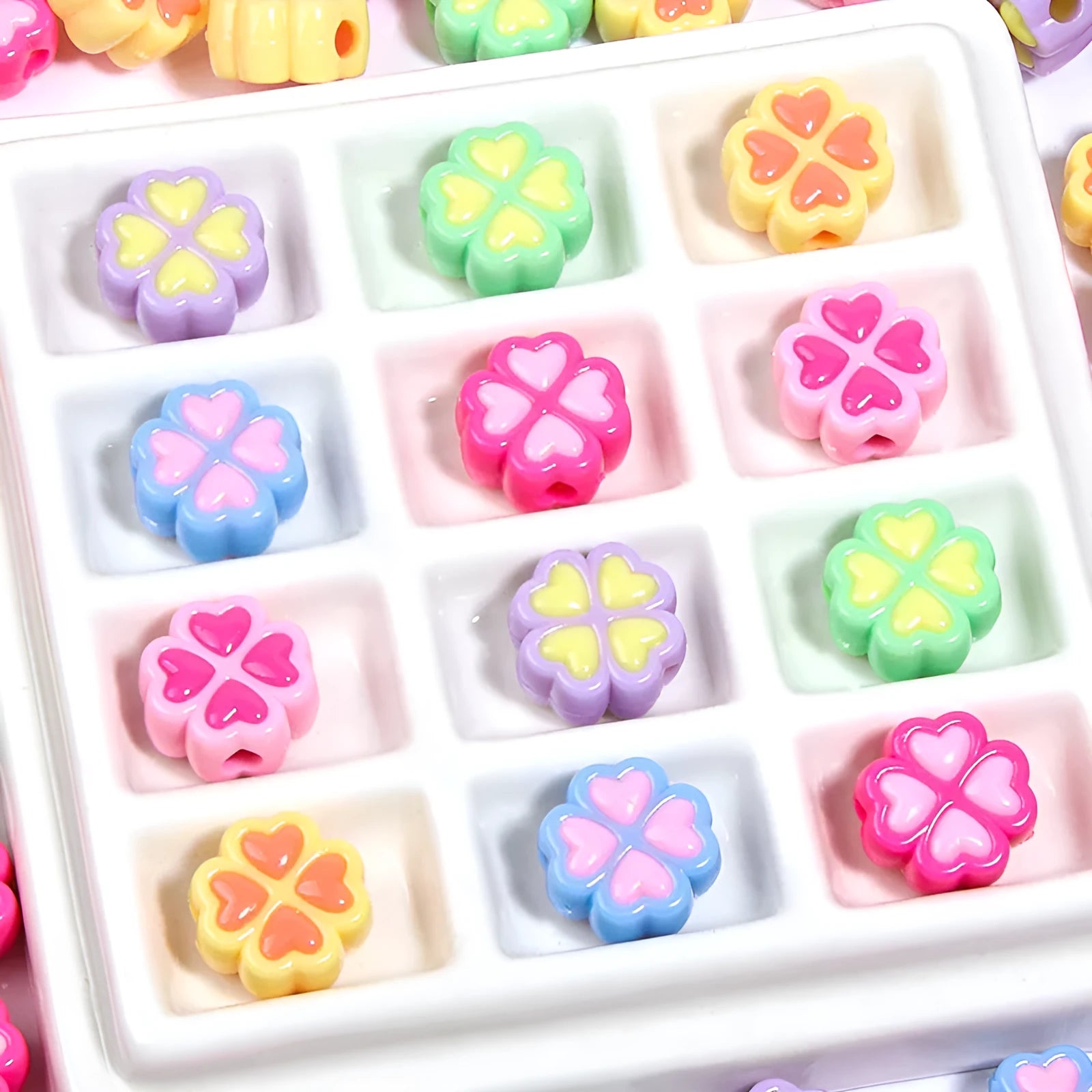 15mm frosted acrylic clover beads in mixed colours including pink, green, blue, and purple