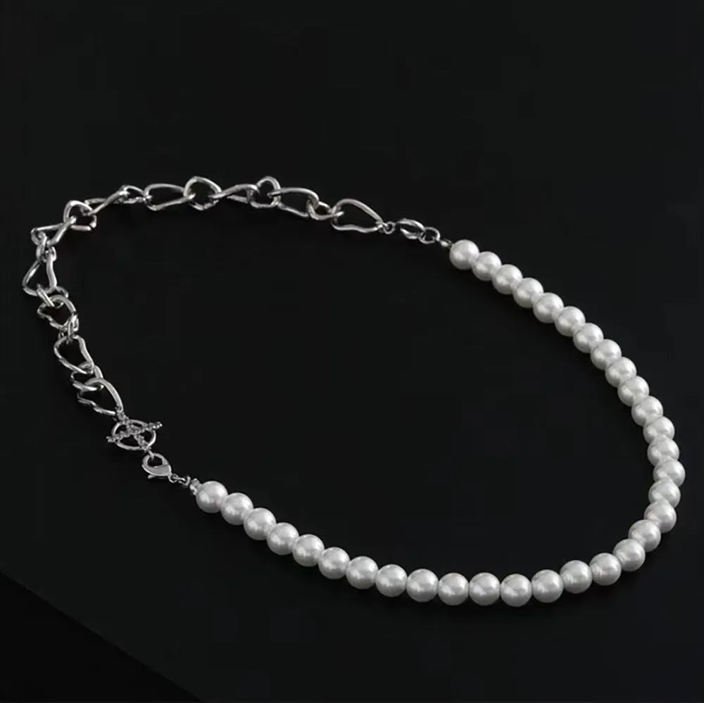 White geometric asymmetric acrylic fashion necklace with a twisted chain design.