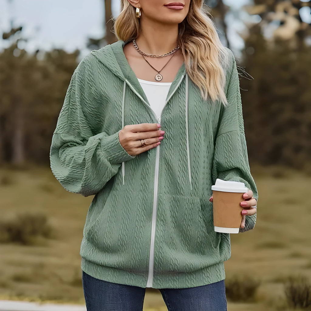 Green women's hooded sweater coat with full zipper front in a loose casual fit.