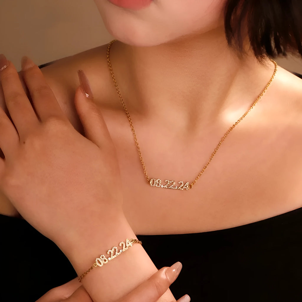 Stainless steel digital bracelet with diamond-set number display on wrist.