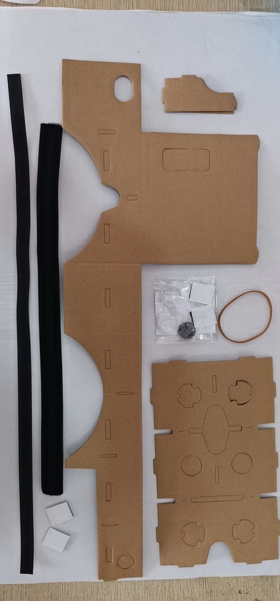 Cardboard VR glasses folded flat with 3D lens, rubber band, Velcro and magnet for 6-inch smartphones