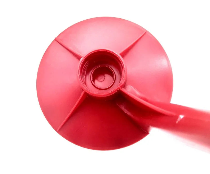 Red Magic Tap soda dispenser attached to inverted 2-litre bottle for push-button drink serving