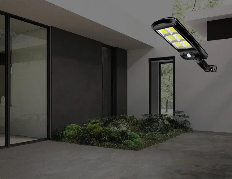 Black solar motion sensor light for outdoor security with IP65 waterproof rating