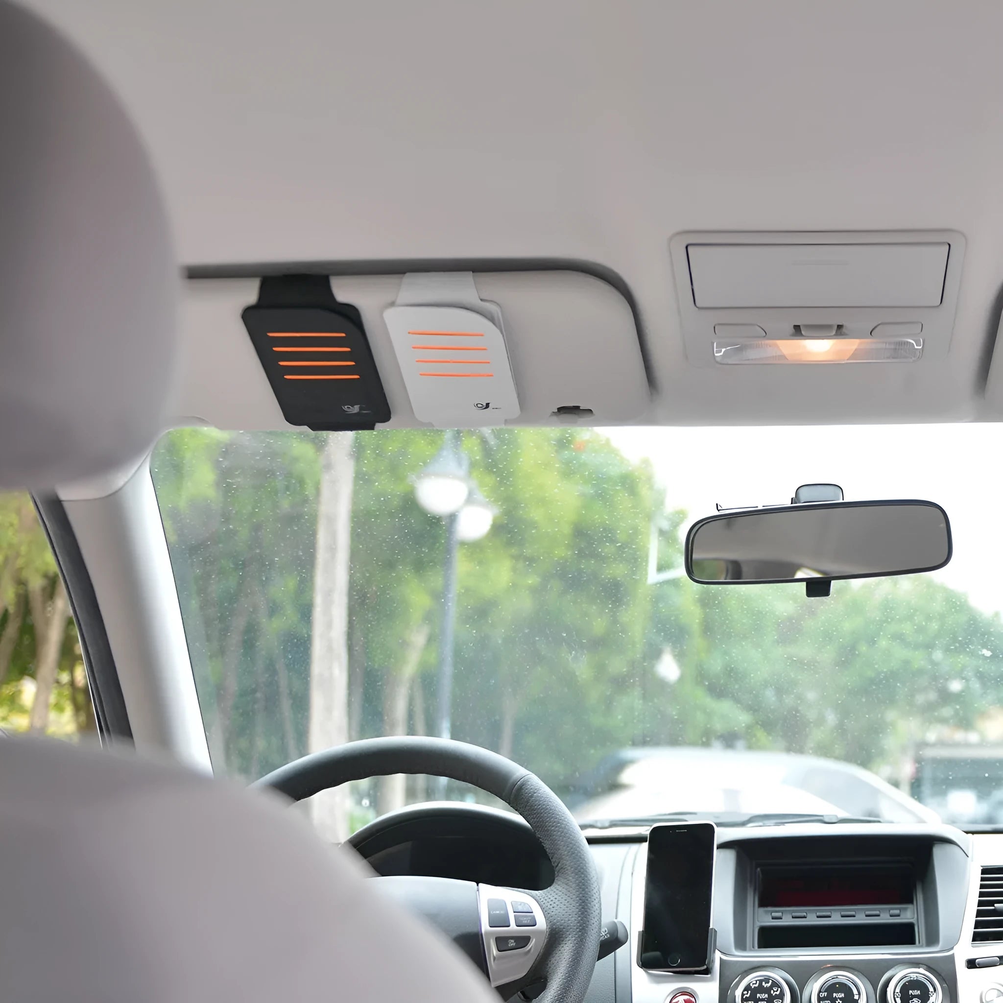 Car sun visor shading panel kit showing four panels and a storage bag in grey or black.