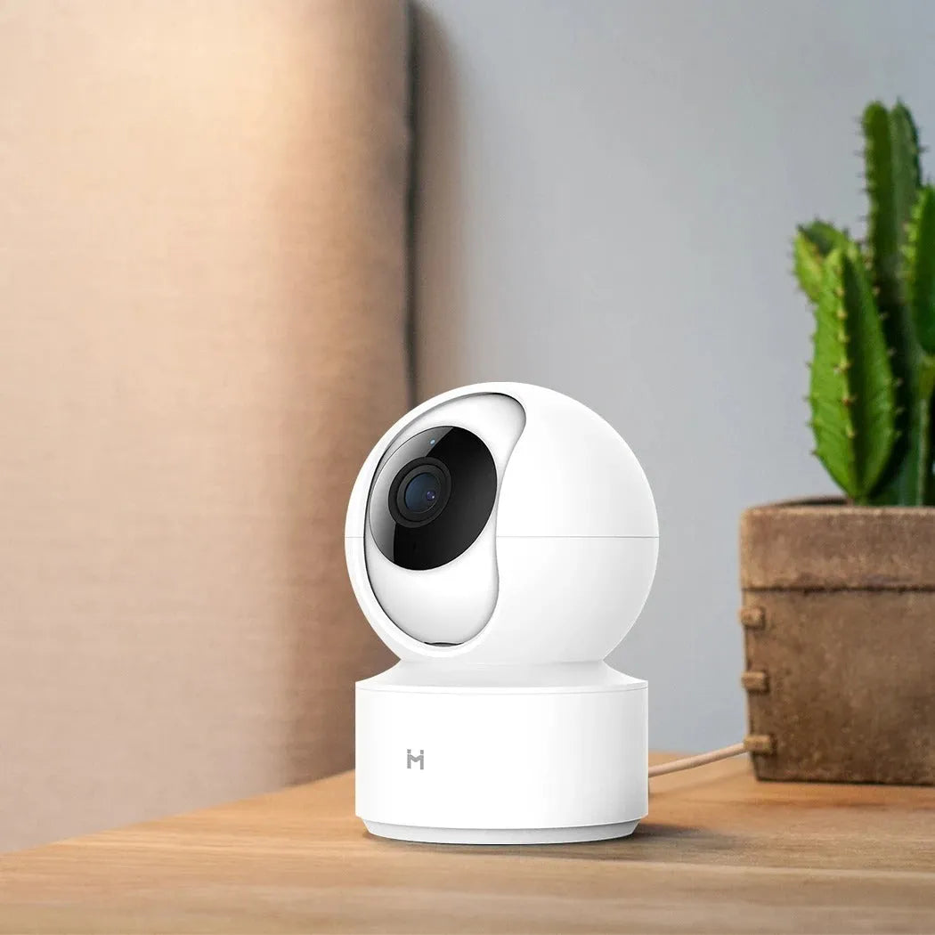 White Xiaobai Smart Camera showing front lens and compact rectangular housing