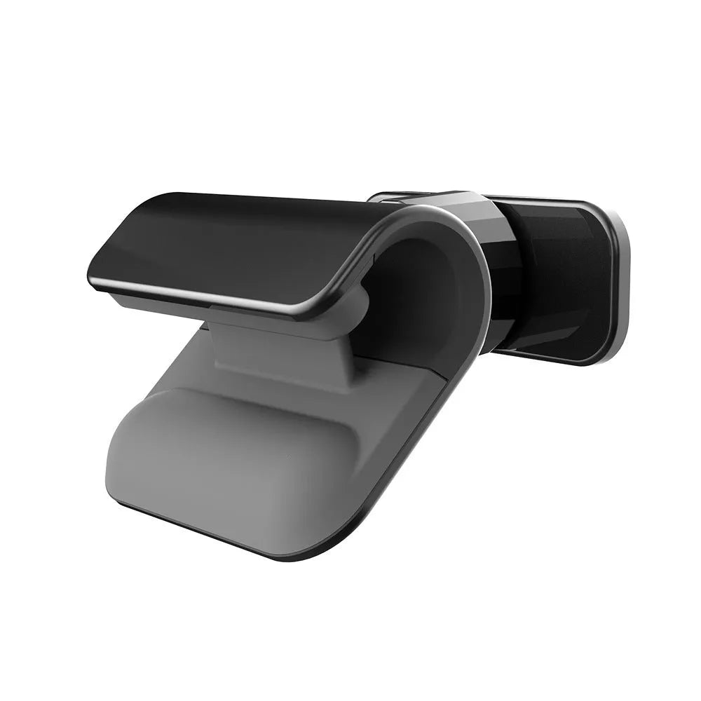 Black 360-degree rotating car phone holder mounted on a car air vent, showing a mobile phone secured in the cradle