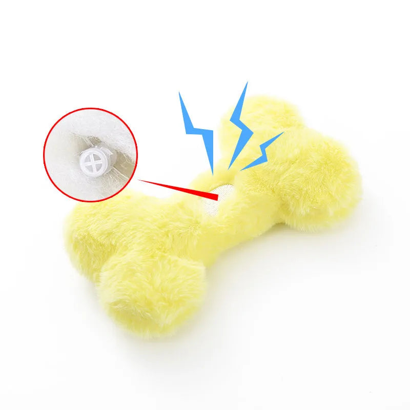 Blue squeaky plush love bone dog toy on a white background