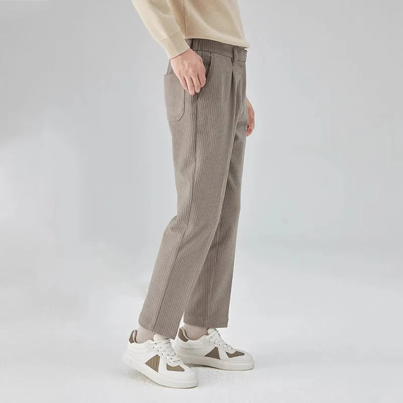 Men's straight-leg corduroy trousers in beige colour showing micro-elastic fabric and mid-waist design