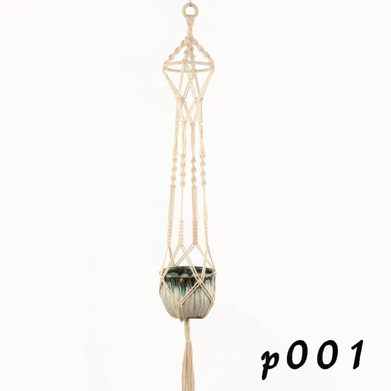 Woven wire planter basket made from cotton rope, shown in a desktop style holding a small plant.