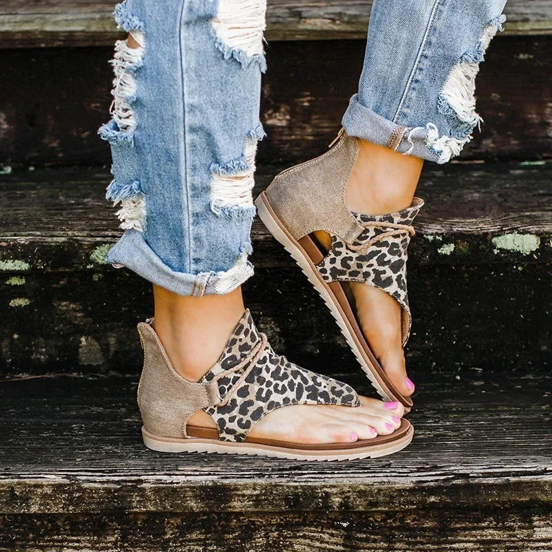 Women's flat cushioned sandals with synthetic upper and rubber outsole in multiple colour options
