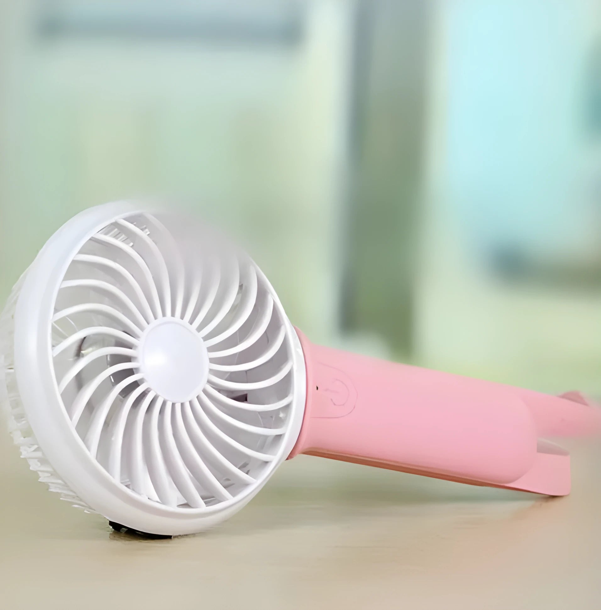 200mm mini USB hand fan with rechargeable battery in blue, green, grey, or pink colours showing adjustable speed controls