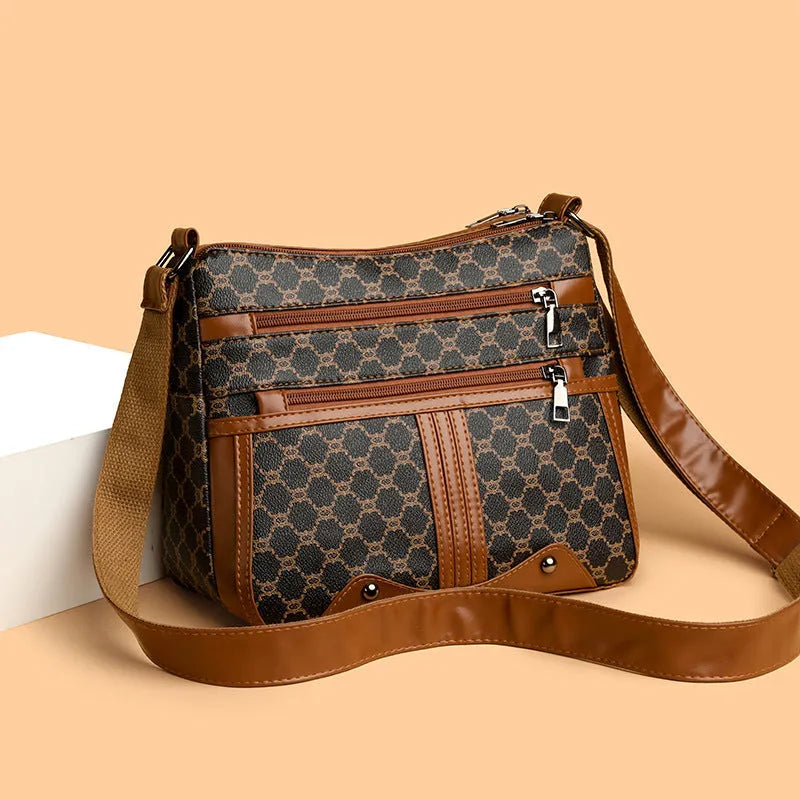 Brown women's crossbody bag with stitching pattern design and adjustable strap