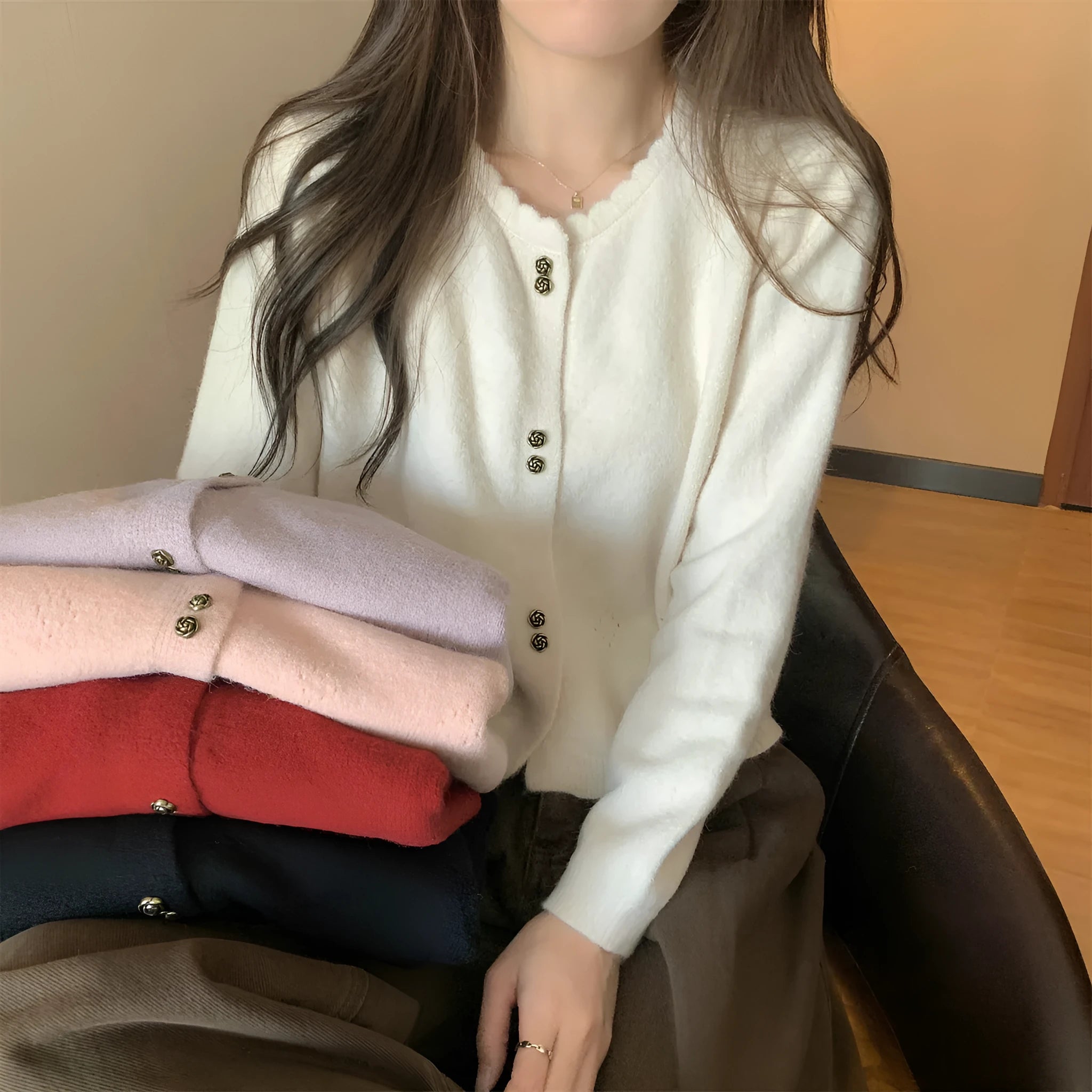 Women's long sleeve acrylic cardigan coat in beige, shown in regular fit.