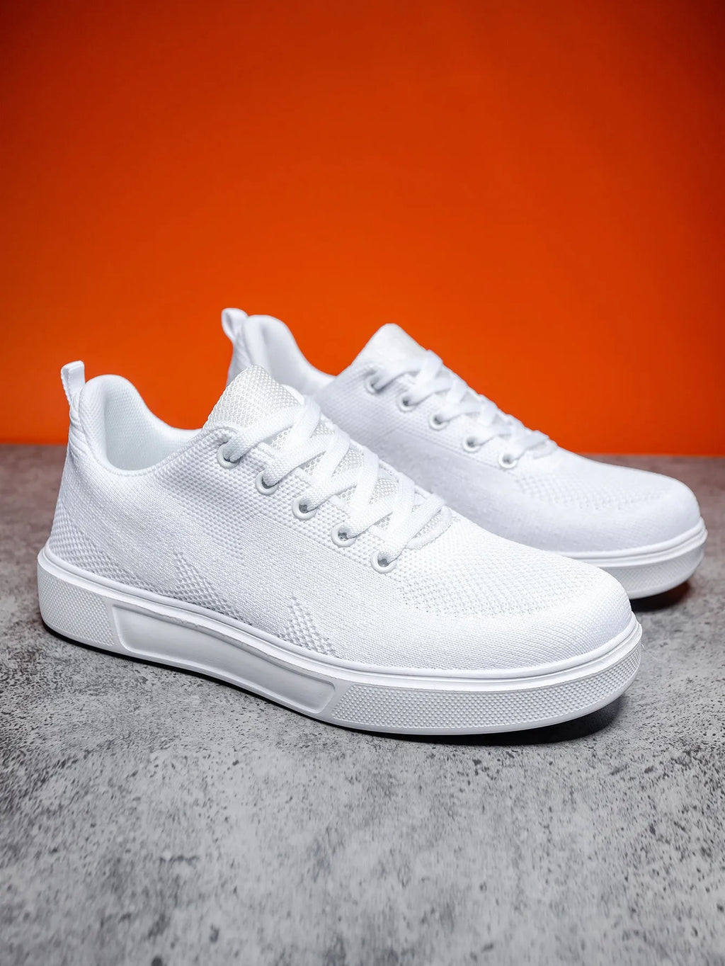 Light white and black mesh casual sneakers with flat EVA soles and round toes on a white background.