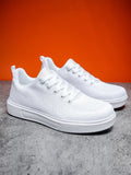 Light white and black mesh casual sneakers with flat EVA soles and round toes on a white background.