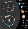 Two natural stone beaded zodiac bracelets with adjustable clasps on a wooden surface.