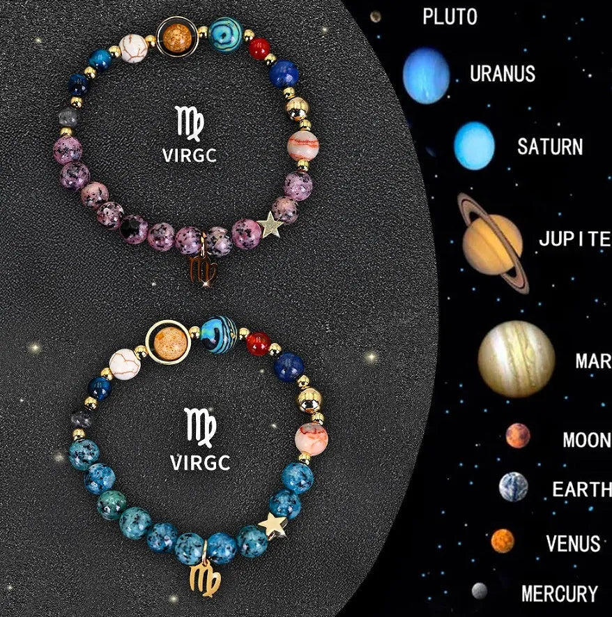 Two natural stone beaded zodiac bracelets with adjustable clasps on a wooden surface.
