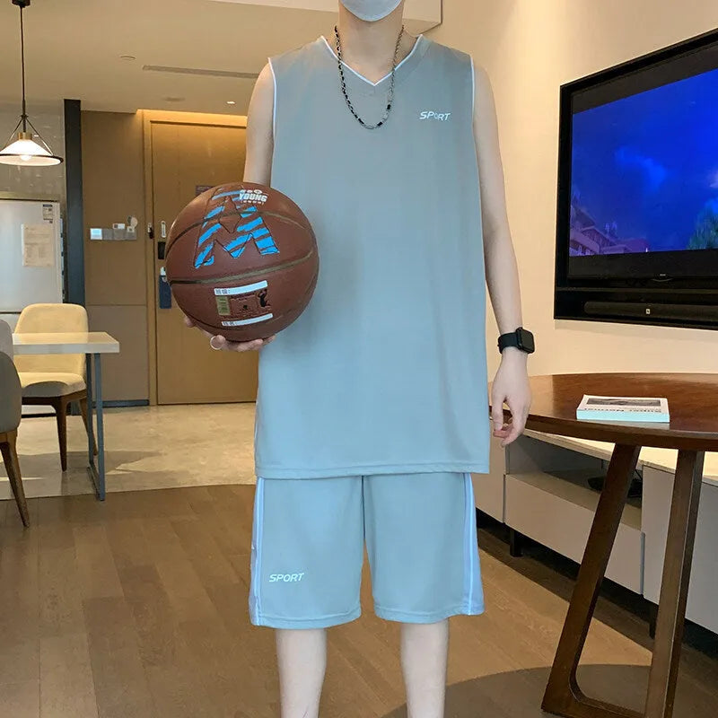 Basketball sports suit comprising sleeveless vest and matching shorts in polyester fabric