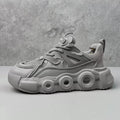 Men's low-top casual sneakers with mesh upper and thick rubber sole in black, grey, or white.