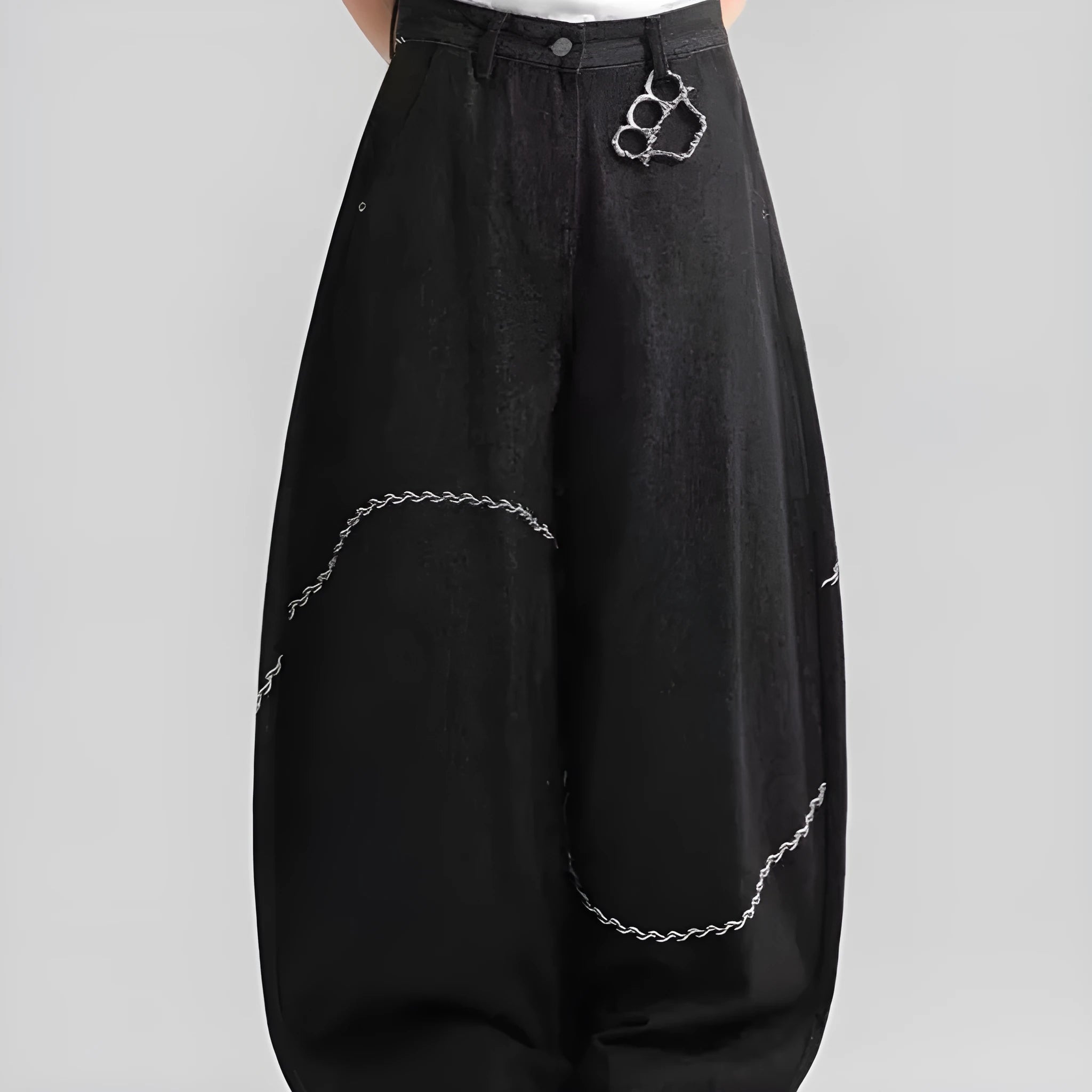 Black straight-leg denim trousers with mid-waist design and zip placket closure