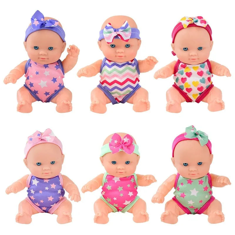 21.5 cm tall simulation baby vinyl doll figurine on display.