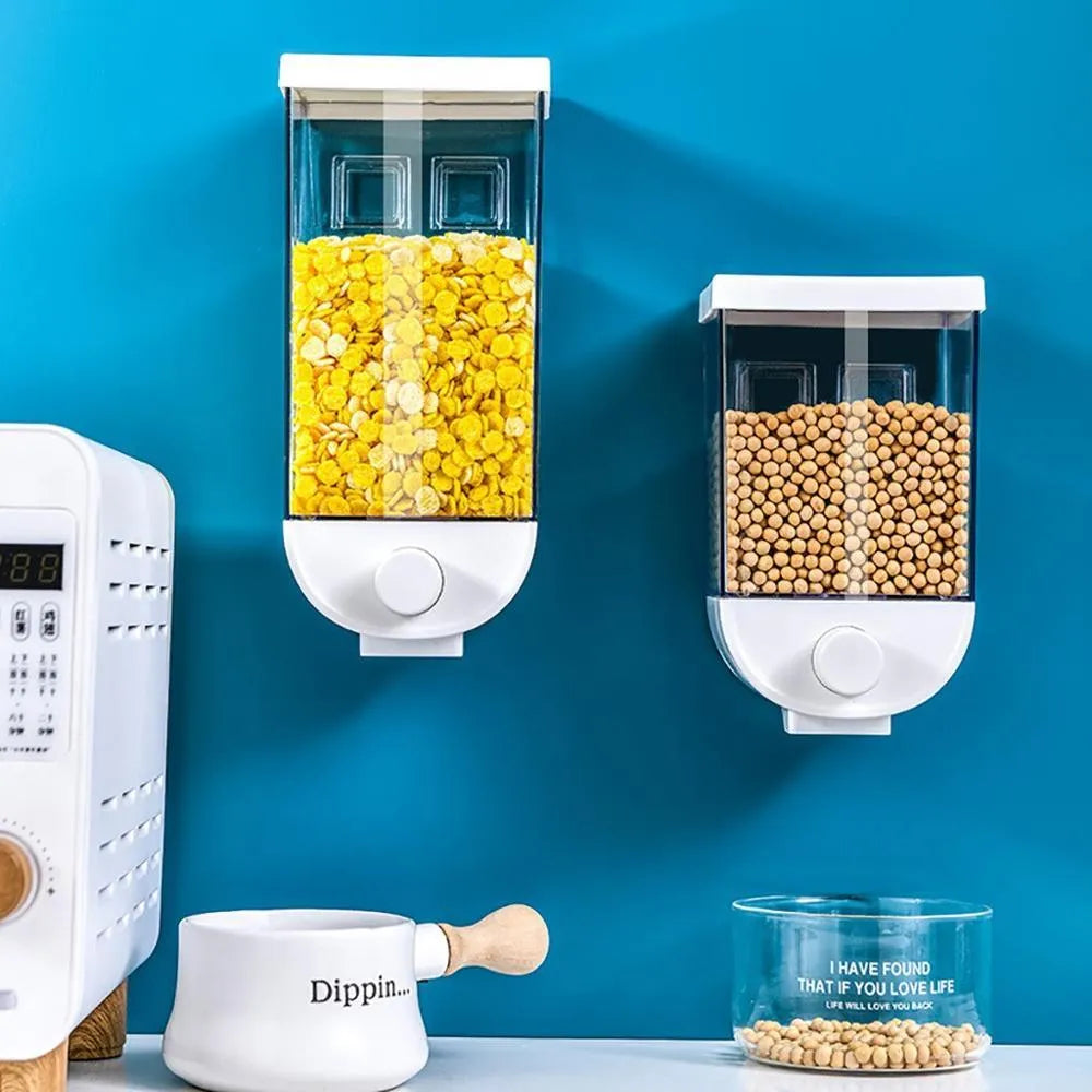 White wall-mounted transparent kitchen storage container with cereal dispenser lid