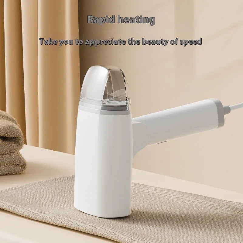 Blue and white handheld garment steamer with 1300W power rating and 85ml water tank