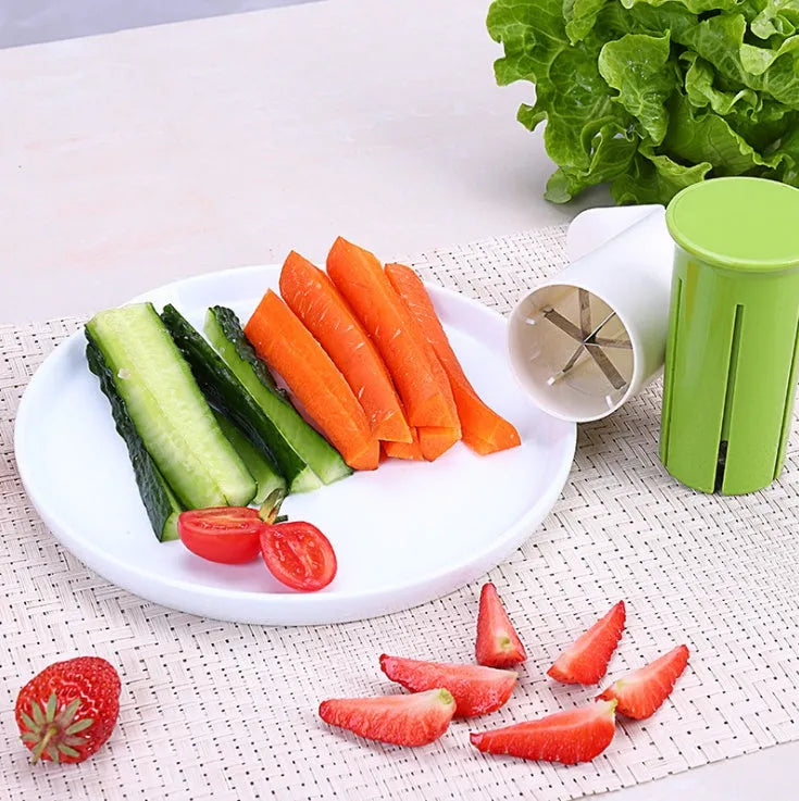 White kitchen vegetable fruit slicer with six stainless steel blades for cutting cucumbers carrots strawberries.