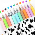 Cow print gel pen set with 0.38mm fine tip, showing 12 assorted colour refills.