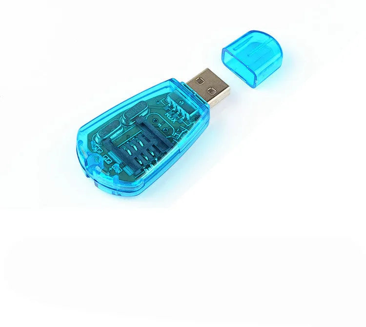 A blue external USB SIM card reader for mobile phones on a flat surface.