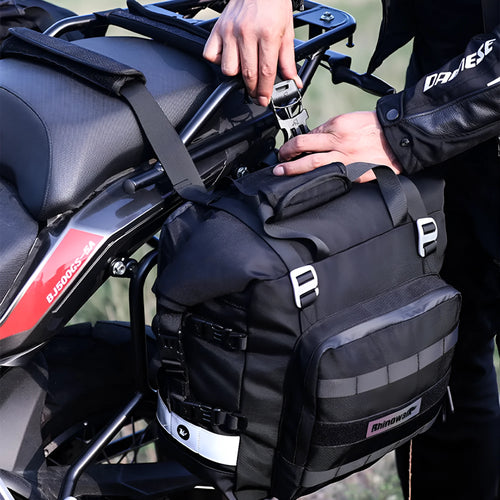 Black 20L quick-release motorcycle side bag mounted on a bike.
