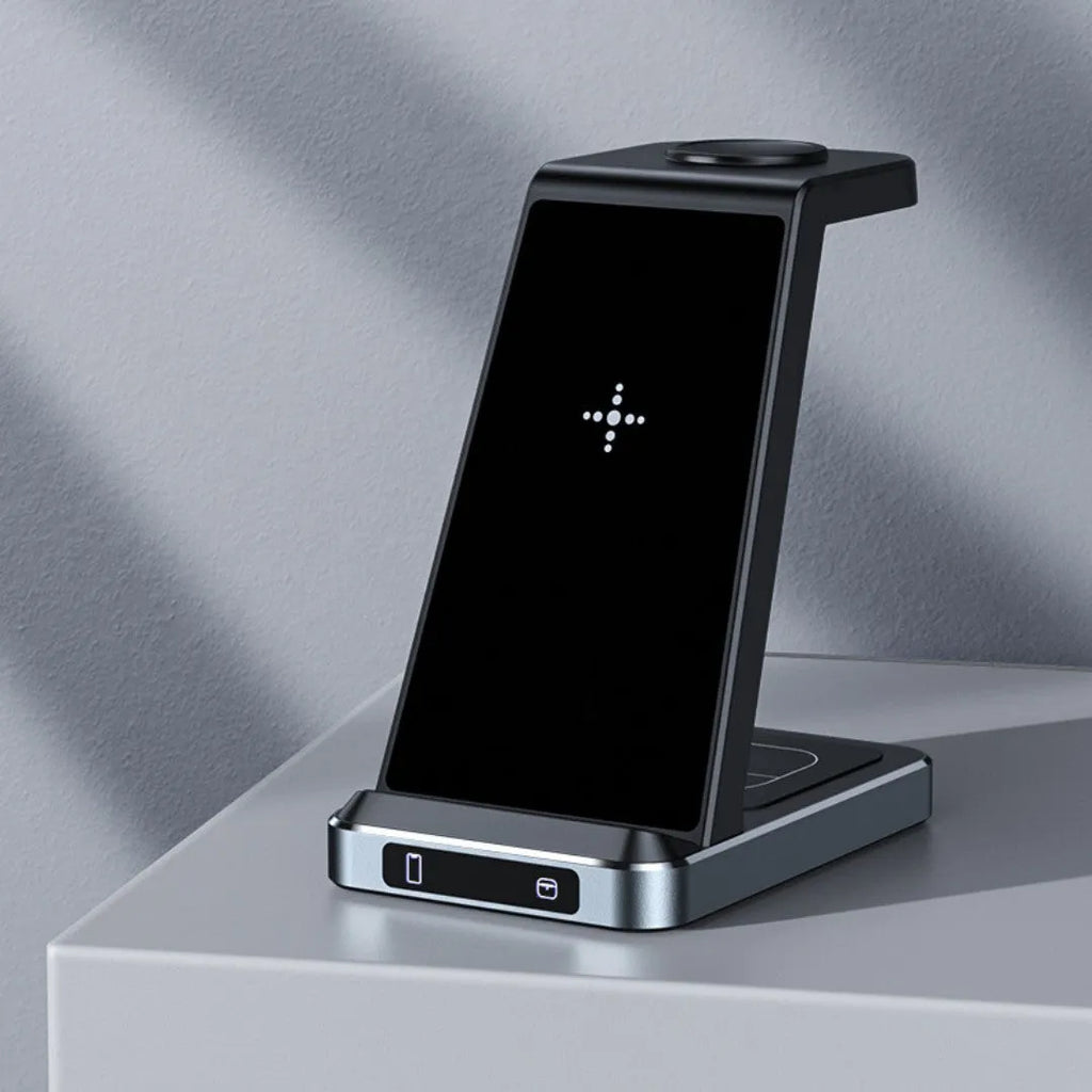 X2 three-in-one wireless charger in black charging a phone, watch, and earbuds