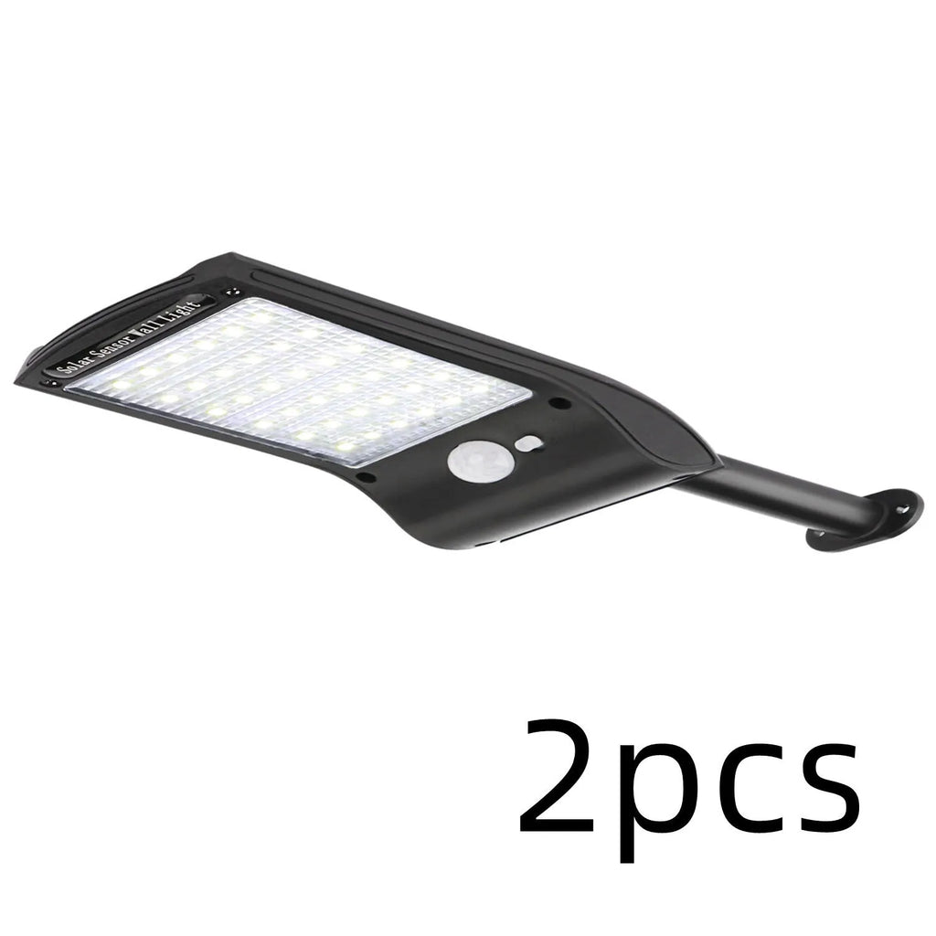Black 36 LED solar-powered wall light with motion sensor and adjustable mounting bracket.