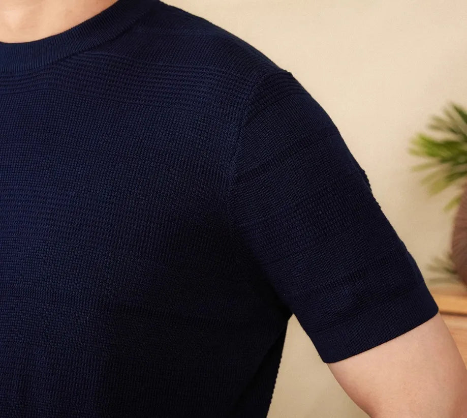 Men's beige retro-style pure cotton short-sleeve t-shirt on a hanger, showing round neck and standard sleeve design.