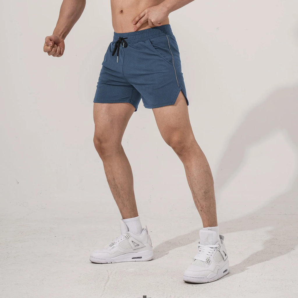 Men's straight-leg polyester sports shorts shown in black, grey, navy, and red colours