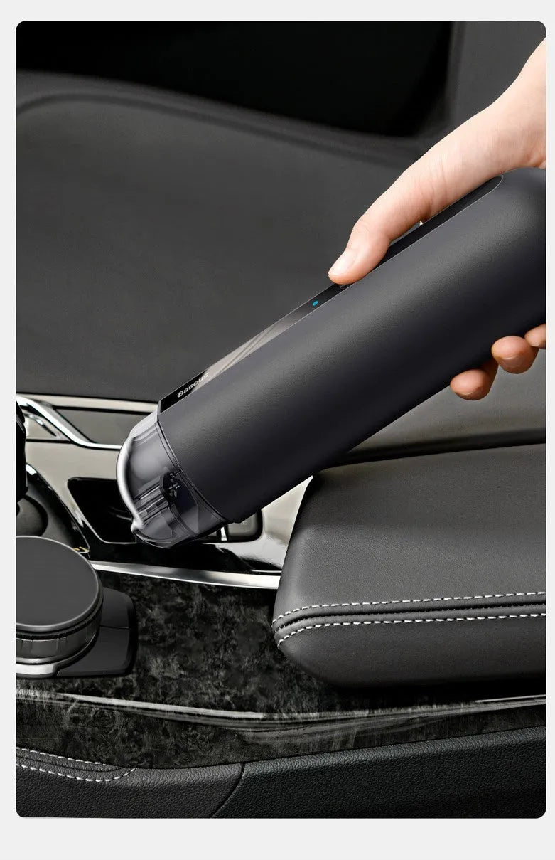 Black handheld wireless car vacuum cleaner with dust bin and blower hose
