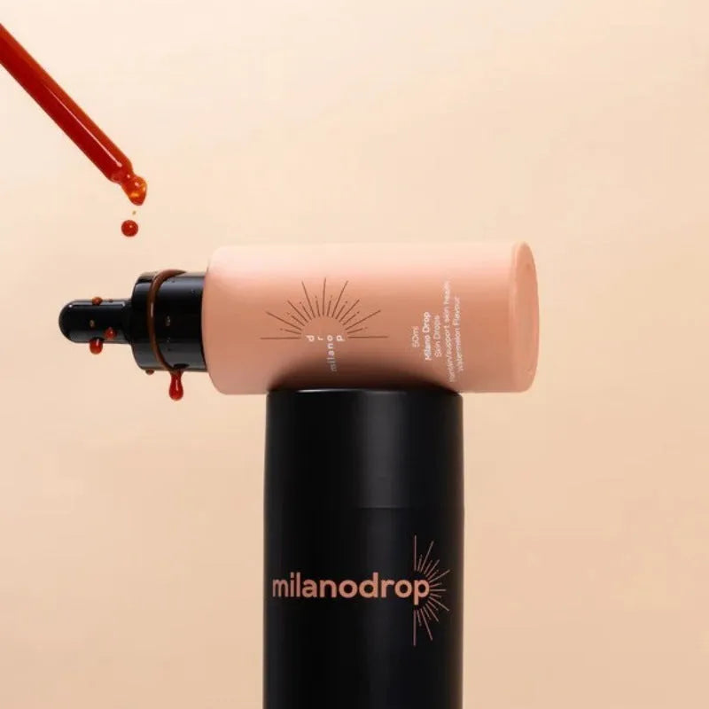 Matte sun tanning black liquid kit with 50ml tanning drops bottle and 75ml tanning flash cream tube.