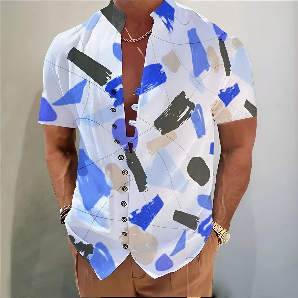 Youth wearing a short sleeve cardigan shirt with a geometric floral pattern in a polyester blend fabric.