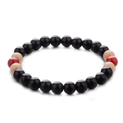 Natural stone beaded bracelet with lava stones for essential oils, ethnic unisex design.