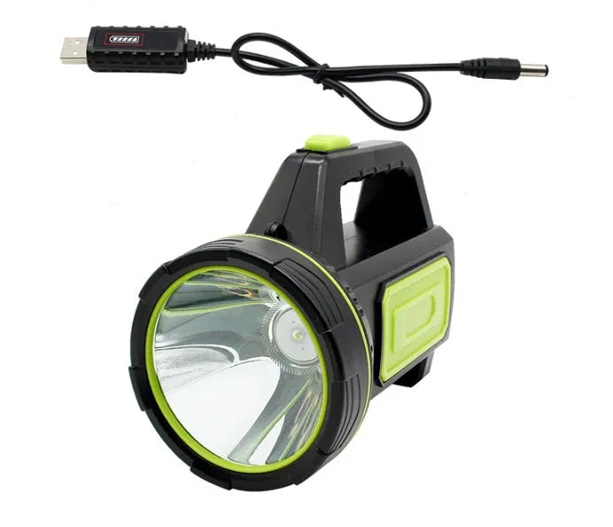 Green USB rechargeable super bright LED flashlight with long-range beam on a table.