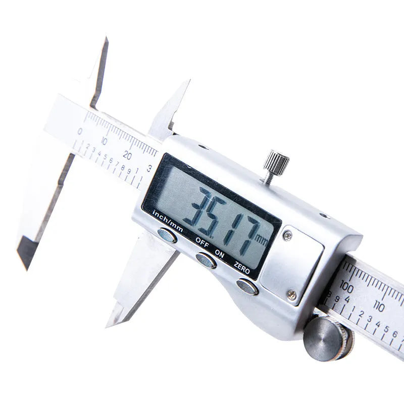 Stainless steel digital vernier caliper showing measurement on LCD display.