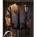 Men's black PU leather jacket with litchi grain texture and extended length design