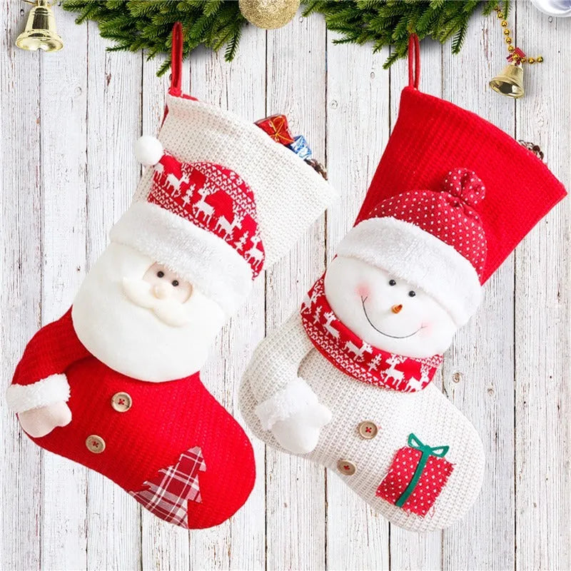 Large red and white knitted Christmas stocking with Santa Claus design for fireplace decoration