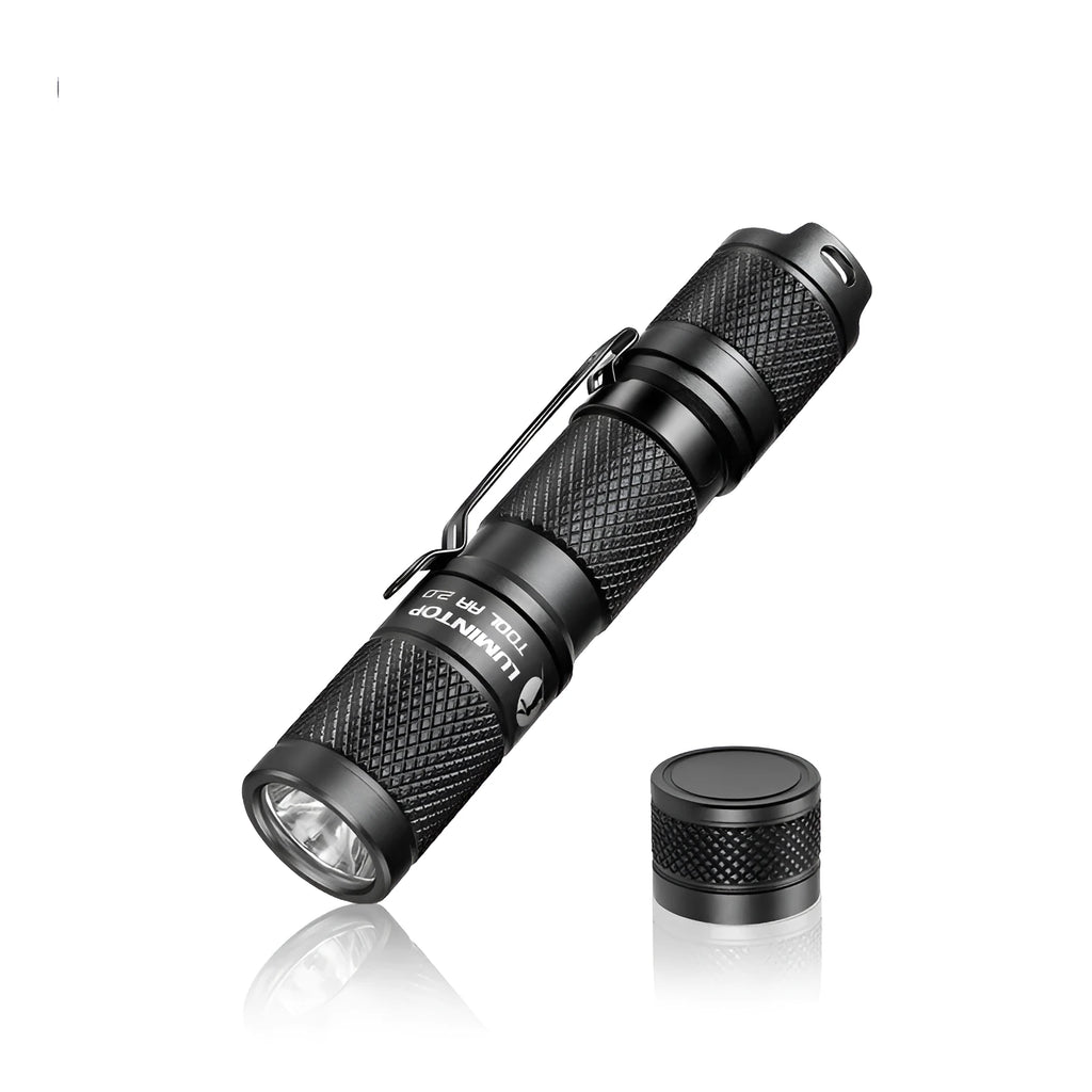 Black Lumintop Tool AA 2.0 aluminium keychain flashlight with magnetic tail cap and diffuser accessory.